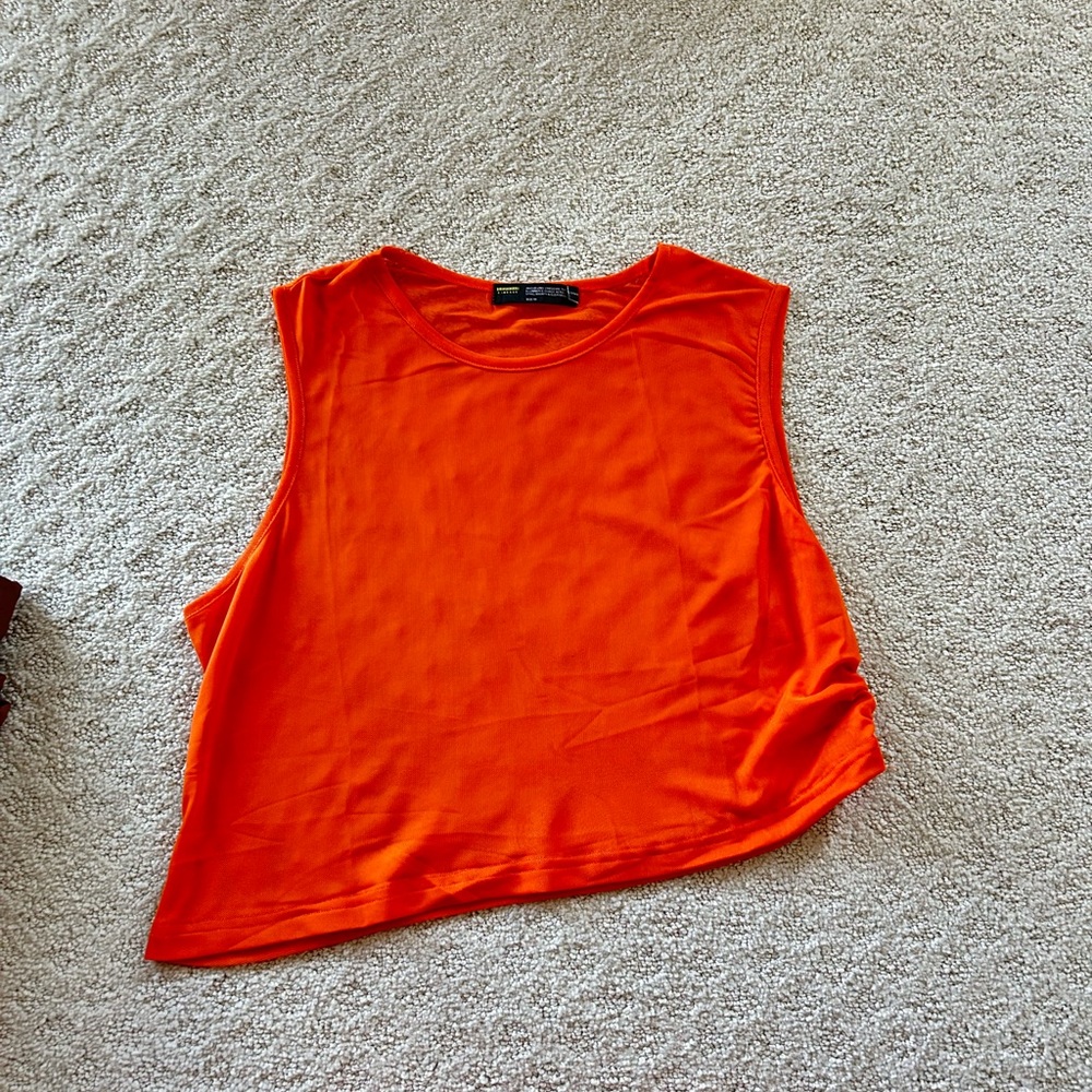 ASYMMETRIC ORANGE SHEER TOP